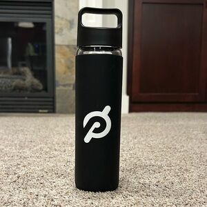 Peloton Glass 16 oz Water Bottle with Logo Sleeve. EUC- cleaned and sanitized.